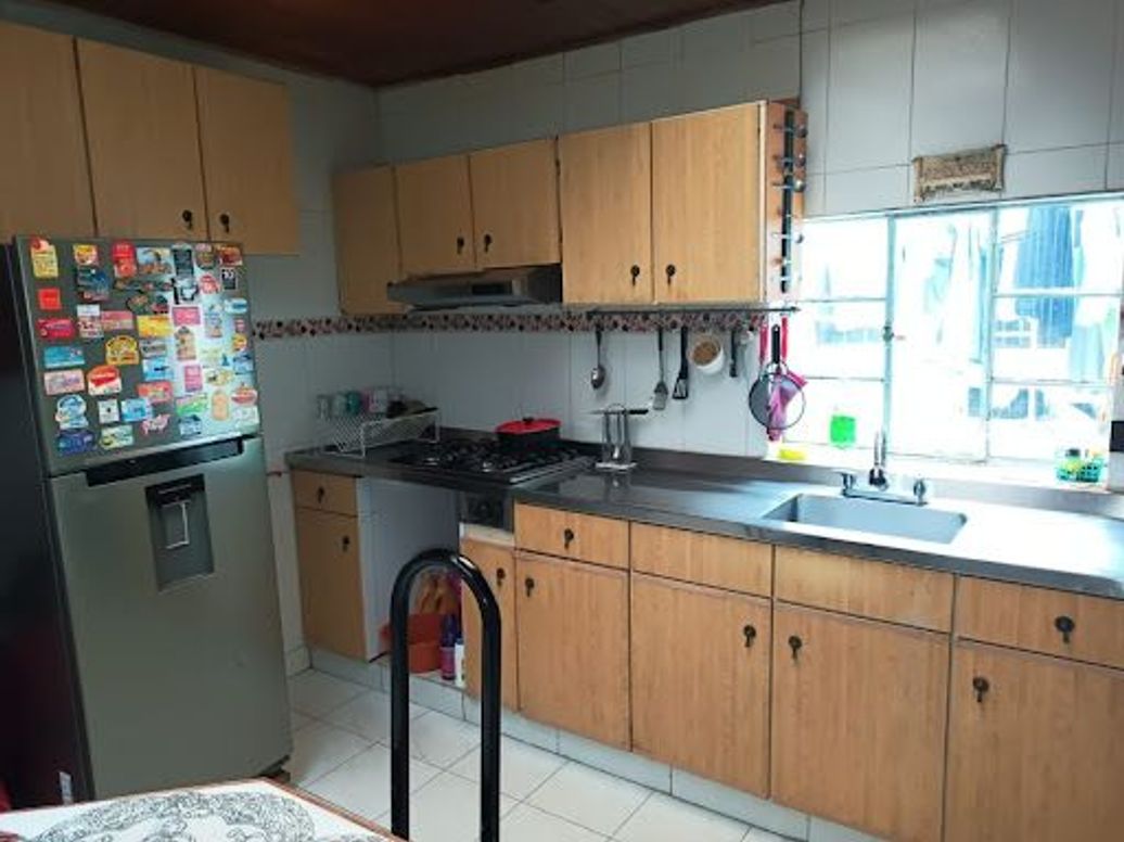 Casa de 8 alcobas en venta en San Luis, Bogotá, 414 m² · foto 6 de 12