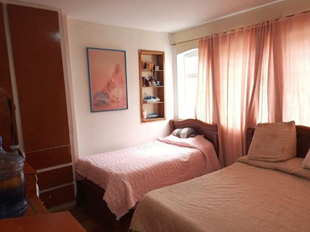 Casa de 8 alcobas en venta en San Luis, Bogotá, 414 m² · foto 12 de 12