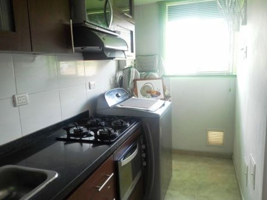 Apartaestudio en venta en Caobos Salazar, Bogotá, 27 m² · foto 2 de 11