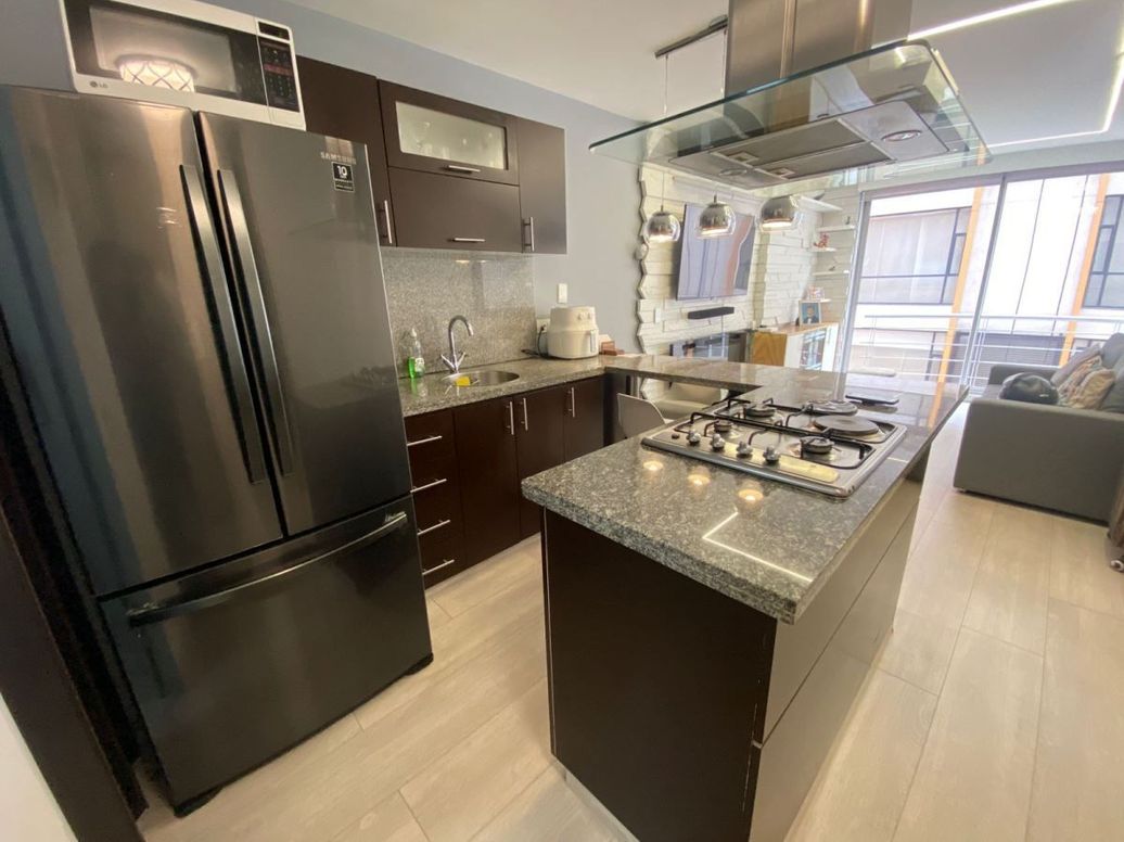 Apartamento de 1 alcoba en venta en Chicó Norte, Bogotá, 70 m² · foto 3 de 11