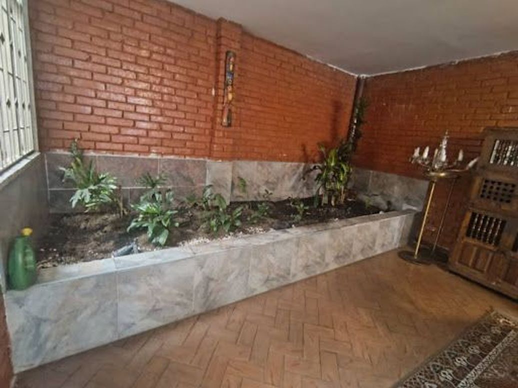 Casa de 7 alcobas en venta en San Luis, Bogotá, 234 m² · foto 4 de 20